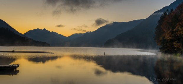 The sun is about to peek over the peak. Just enough light for a long exposure. 