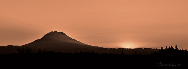 This is about 30 seconds after the sun appeared. You can see the snow blowing near the peak. 