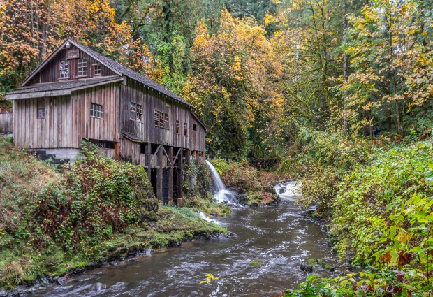 Cedar Creek Grist Mill, still work, huge pulleys and belts spinning above and below are turning and churning to produce flour, corn meal and apple cider. Excellent cider!